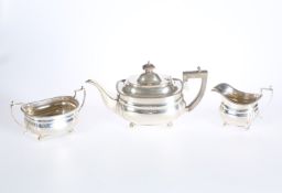 AN EDWARDIAN THREE PIECE SILVER TEA SERVICE, C.S. HARRIS & SONS LTD, LONDON 1909 AND 1910