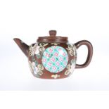 AN INTERESTING CHINESE POLYCHROME ENAMELLED YIXING TEAPOT