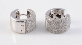 A PAIR OF CONTEMPORARY 18CT WHITE GOLD AND DIAMOND EARRINGS