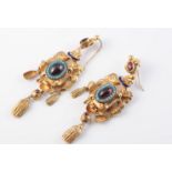 A PAIR OF EARLY 19TH CENTURY GILT METAL AND GARNET SET EARRINGS