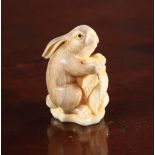 A JAPANESE NETSUKE OF A RABBIT