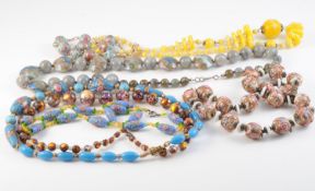 A COLLECTION OF SEVEN VINTAGE BEAD NECKLACES