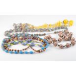 A COLLECTION OF SEVEN VINTAGE BEAD NECKLACES