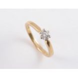 AN 18CT YELLOW GOLD AND DIAMOND RING