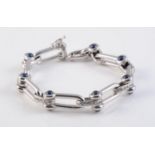 AN 18CT WHITE GOLD, SAPPHIRE AND DIAMOND BRACELET BY VOURAKIS