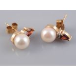 A PAIR OF CULTURED PEARL, DIAMOND AND GARNET SET EARRINGS