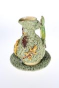 A CALDAO PALISSY STYLE MAJOLICA JUG AND STAND