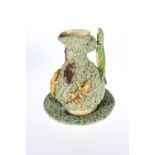 A CALDAO PALISSY STYLE MAJOLICA JUG AND STAND