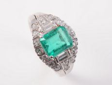AN 18CT WHITE GOLD, COLOMBIAN EMERALD AND DIAMOND RING