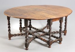 A LARGE CHARLES II JOINED OAK GATELEG DINING TABLE, CIRCA 1680 AND LATER