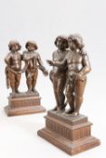 A PAIR OF FLEMISH OAK FIGURE GROUPS OF PUTTI, POSSIBLY EARLY 18th CENTURY