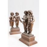 A PAIR OF FLEMISH OAK FIGURE GROUPS OF PUTTI, POSSIBLY EARLY 18th CENTURY