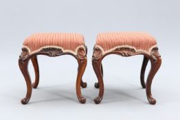 A PAIR OF VICTORIAN ROSEWOOD AND UPHOLSTERED STOOLS, CIRCA 1860-70