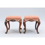 A PAIR OF VICTORIAN ROSEWOOD AND UPHOLSTERED STOOLS, CIRCA 1860-70