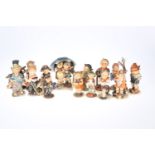 A COLLECTION OF GOEBEL HUMMEL AND SIMILAR GERMAN FIGURES, SECOND HALF 20th CENTURY