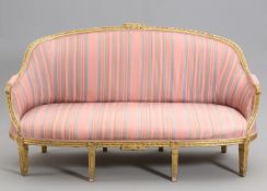 A LATE 19TH CENTURY GILTWOOD CANAPE, IN LOUIS XVI STYLE