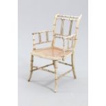 A REGENCY PAINTED FAUX BAMBOO CHILD'S CHAIR