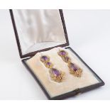 A PAIR OF MID 19TH CENTURY AMETHYST EARRINGS