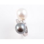 A CULTURED PEARL AND DIAMOND RING