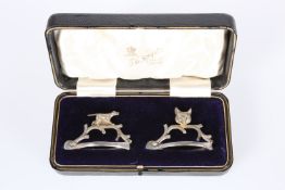 A PAIR OF EDWARDIAN SILVER MENU HOLDERS