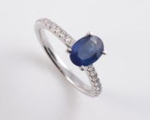 AN 18CT WHITE GOLD, SAPPHIRE AND DIAMOND RING