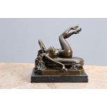 AN EROTIC BRONZE FIGURE OF A RECLINING NUDE, 20th CENTURY