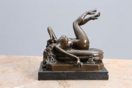 AN EROTIC BRONZE FIGURE OF A RECLINING NUDE, 20th CENTURY