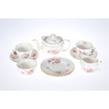 A ROYAL CROWN DERBY "DERBY POSIES" TEA SERVICE FOR TWO