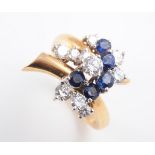 AN 18CT YELLOW GOLD, SAPPHIRE AND DIAMOND RING