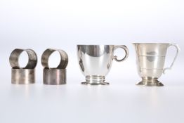 A SILVER CHRISTENING MUG