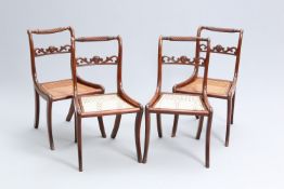 A SET OF FOUR REGENCY MAHOGANY AND CANEWORK DINING CHAIRS