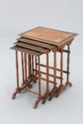 A SET OF REGENCY ROSEWOOD AND PARQUETRY QUARTETTO NESTING TABLES