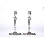 A PAIR OF ADAM REVIVAL SILVER CANDLESTICKS, THOMAS BRADBURY & SONS, SHEFFIELD 1925