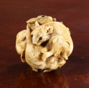 A JAPANESE CARVED IVORY BALL OF RATS