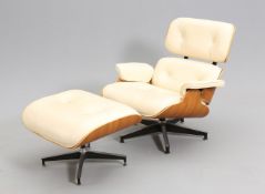 AN EAMES SWIVEL CHAIR AND MATCHING STOOL
