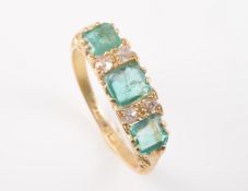 A LATE 19TH CENTURY EMERALD AND DIAMOND RING