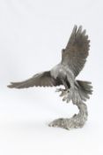 A LARGE BRONZED RESIN MODEL OF AN EAGLE
