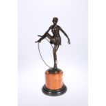 AN ART DECO STYLE BRONZE FIGURE OF A HOOP GIRL