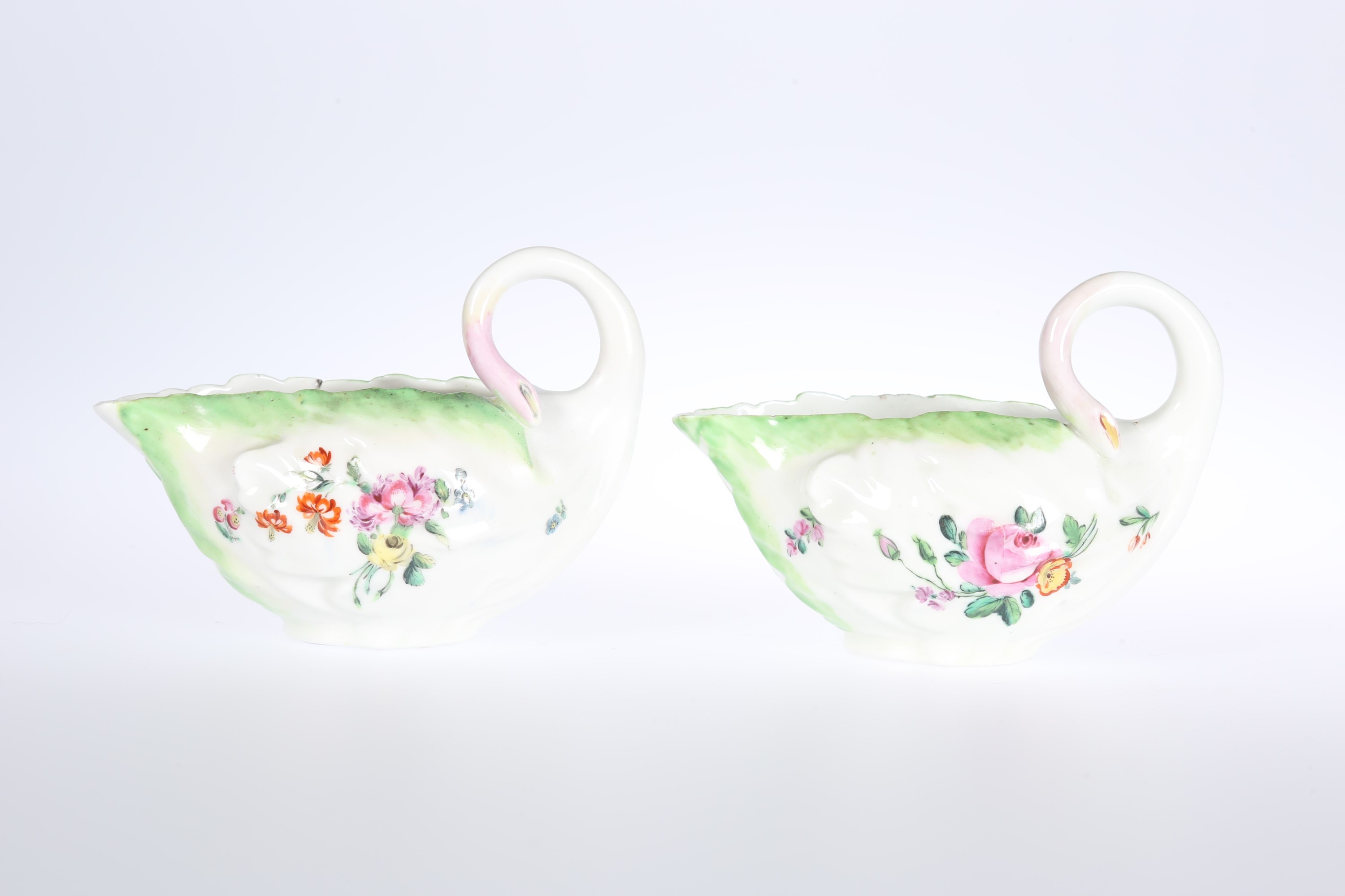 A PAIR OF DERBY COS LETTUCE LEAF MOULDED SAUCE BOATS, CIRCA 1760