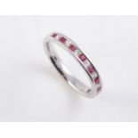 AN 18CT WHITE GOLD, RUBY AND DIAMOND RING