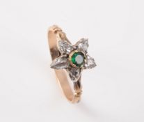 A LATE 19TH CENTURY DIAMOND AND EMERALD RING