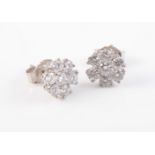 A PAIR OF DIAMOND EAR STUDS