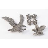 FOUR SILVER AND MARCASITE SET BROOCHES