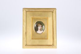 A CONTINENTAL PAINTED PORCELAIN PORTRAIT MINIATURE