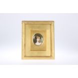 A CONTINENTAL PAINTED PORCELAIN PORTRAIT MINIATURE