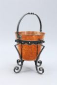 AN ARTS AND CRAFTS COPPER AND WROUGHT IRON COAL BUCKET, CIRCA 1900