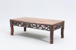 A CHINESE HARDWOOD LOW TABLE, EARLY 20TH CENTURY