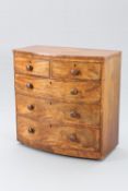 A MID 19TH CENTURY MAHOGANY BOW-FRONT CHEST OF DRAWERS