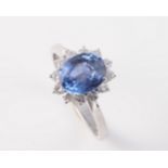 AN 18CT WHITE GOLD, SAPPHIRE AND DIAMOND RING