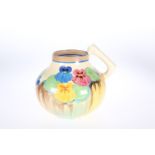 A CLARICE CLIFF "DELECIA PANSIES" PATTERN VASE